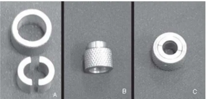 FIGURE 2- Specimens subjected to bond strength (loop) testing in a universal testing machine