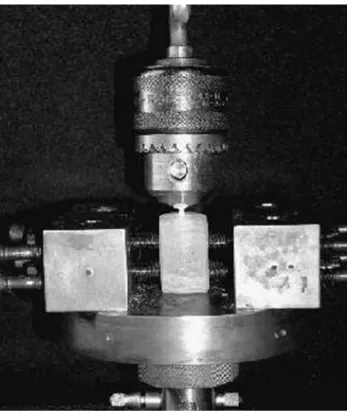 FIGURE 1- Low-speed handpiece coupled to a surveyor for post space preparation