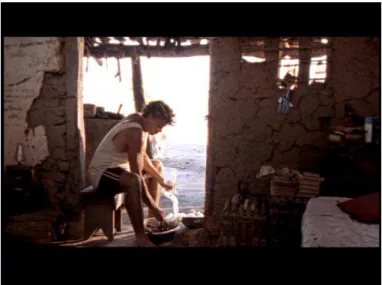 Figura 7 – Primeira aparição de Antônio Biá no filme, enchendo lingüiça. 