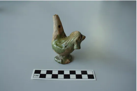Fig. 11: Green glazed whistle found in Carnide 
