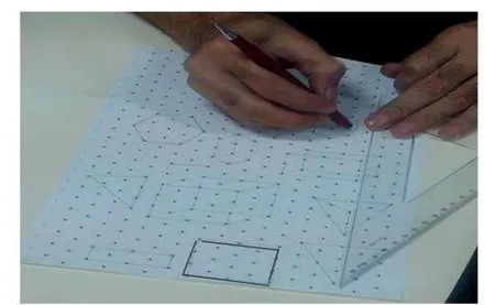Figura 7  –  Construção do Tangram pelo aluno no papel isométrico. 