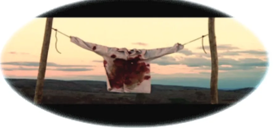 FIGURA 6 – Camisa manchada de sangue