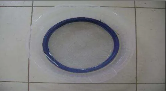 Figura 9: Detalhe da peneira e do recipiente de plástico. 