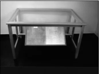 Fig 1. Acrylic t op t able w it h angled mirror below.