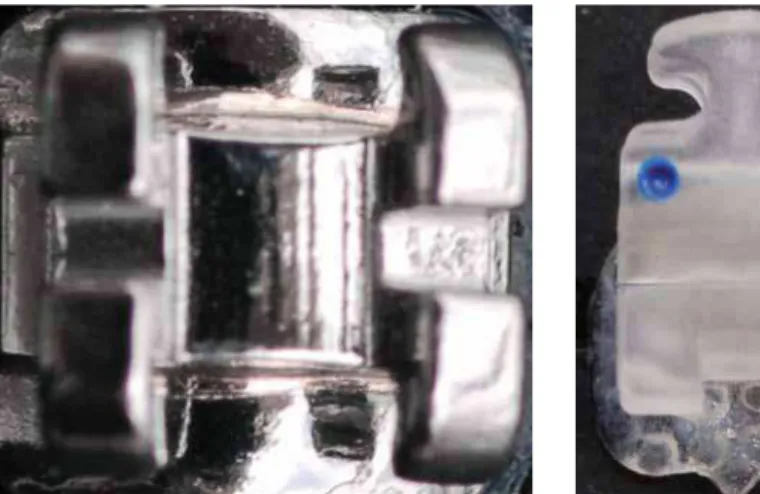 FIGURA  3  -  Detalhe  do  conjunto  fio  metálico  amarrado  ao  braquete  –  no  caso  plástico  –  colado em suporte metálico, sendo  traciona-do em máquina universal de ensaio mecânico.