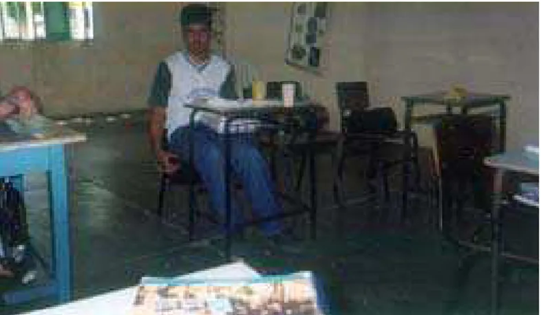 Figura 21: O aluno Paulo durante o intervalo em sala de aula. 