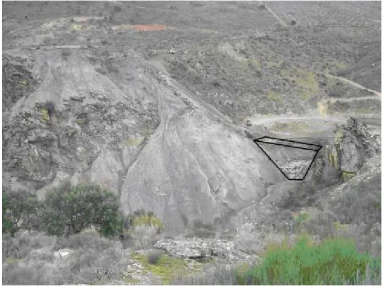 Figure 8. View from downstream of the dam. A scar in the reservoir bottom is visible. 