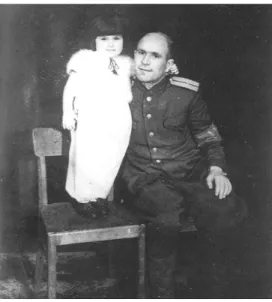 Fig. 6. Boris Sergejewitsch Makarov, first Commandant of Fürstenberg, with Lilja, one  of the many liberated children, May/June 1945