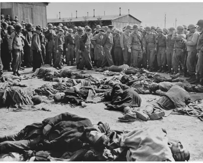 Fig. 2. General Dwight Eisenhower and other high ranking U.S. Army officers view the  bodies of prisoners who were killed during the evacuation of Ohrdruf, April 12, 1945