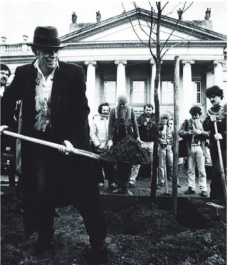 Fig. 10 Joseph Beuys planting the first oak, photograph by Dieter Scwerdtle in Scholtz, 1986