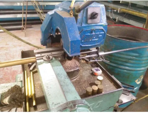 Figure 2.11: Cutting brass tubes by metal cutting saw at “Castro Lighting” factory. 