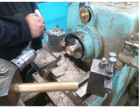 Figure 2.12: Making hole in metal with drill at “Castro Lighting” factory. 