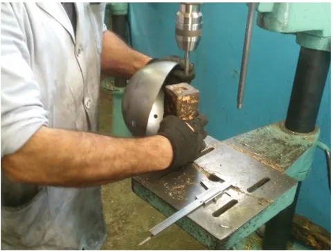 Figure 2.15: Drilling brass plate to fix at “Castro Lighting” factory. 