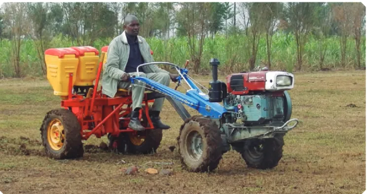 Figure 4.3. Two-wheel tractor equipped with a no-till seeder.
