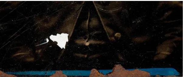Figure 25: example of abrasion and detachment of the binder and formation of rust.  