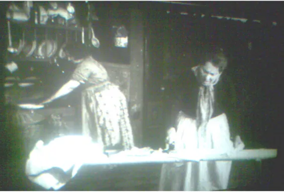 Figura 15. As criadas Joana e Juliana na cozinha de Luísa, no filme de Georges Pallu (1923)