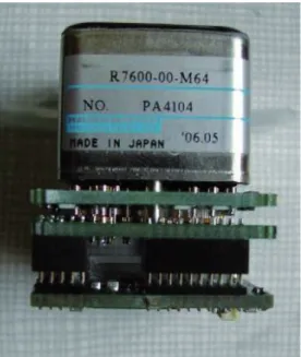 Figure 8 . A side view of a MAPMT with a stack of three boards, the PMF, which performs the readout of the fibre signals.