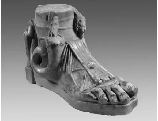 Fig. 5.  Votive foot with sandal and Isis, Serapis and Arpocrates.