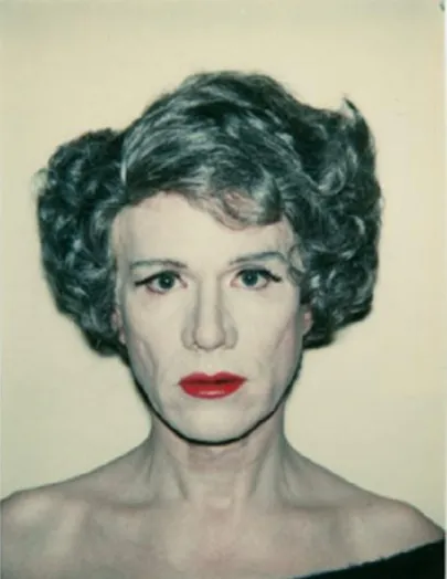 Fig. 11. &#34;Auto-retrato como Travesti&#34; (Polaroid  –  1980)  –  Andy Warhol.  