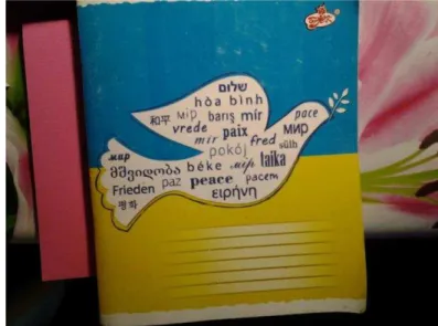 Fig 1. Cover of the exercise-book with usage of Ukrainian flag colours and  the symbol of peace – the Pigeon 
