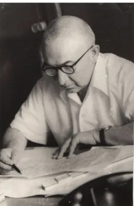 Fig. 5: I. L. Bershtein at the working desk in his cabinet. This photo, pictured in 1967, is very specific to his nativity of a man who spent his life in science.