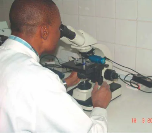 Figure 1. Low-Cost LED-Based Fluorescence Microscopy Being Evaluated at a TDR/WHO Trial  Site in Abuja, Nigeria