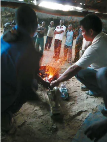 Fig. 2. Vigorous burning of charcoal is achieved with a hand-powered  blower.