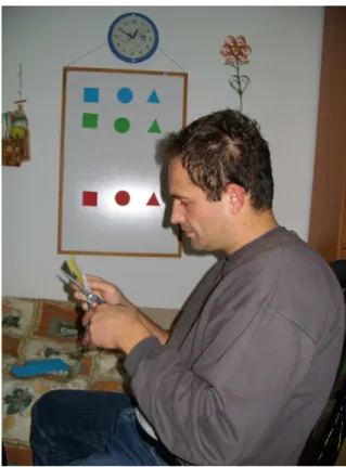 Figure 2.14: A white wall sticked with papers of different shapes and col- col-ors (Kareva, 2011a)