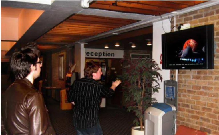 Figure 2.12 - A participant using a space game in a public  setting 