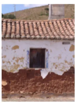 Figure 1. Rammed earth house in Bemposta, Odemira. Detachment of the coatings due to  capillary rising and problably hygroscopic salts, with degradation of the wall