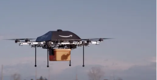 Figura 2 - Drone Prime Air da Amazon carregando um pacote  (AMAZON, 2018) 