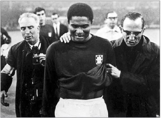 Figure 1: Eusébio leaving the pitch following the loss to England
