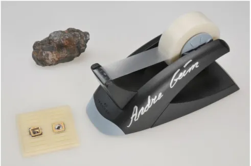 Figure 1: A lump of graphite, a graphene transistor and a tape dispenser. Donated to the Nob el Museum in Stockholm  b y Andre Geim and Konstantin Novoselov in 2010