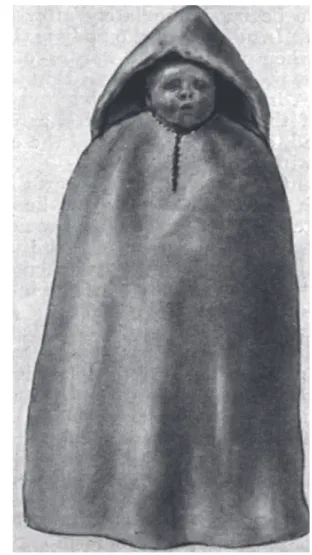 Figure 2 – Child wrapped in a cape of wool. 18