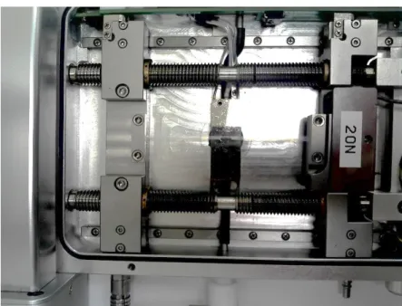 Figure 2.3 – Linkam TST350 Universal Test Machine. Highlighted: Cross- Cross-heads to which the sample is griped