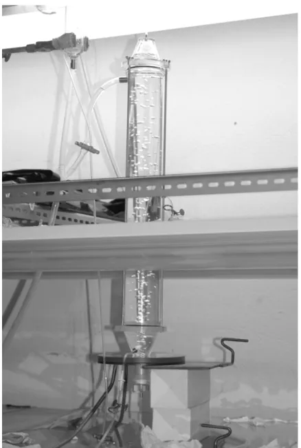 Figure 9 – Left image: the sampling point about half height of the main cylinder; right image: the top  cone and recirculation exit immediately below it