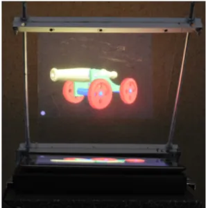 Figure 9: Hologram visualisation of the 3D model of a can- can-non with the EducHolo and an iPad.