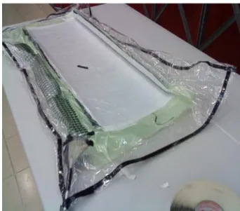 Figure 3.3 – Vacuum bagging final installation.  