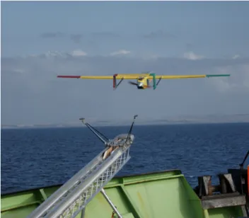Fig. 3. Image sequence showing the operation of the UAV release on a 15 Kg test mass.