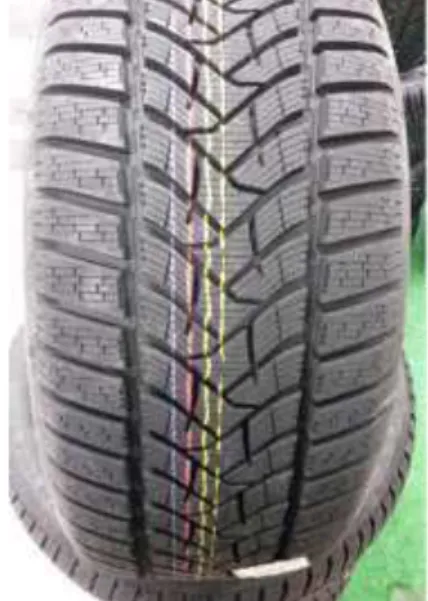 Figure 15. New tire with colored stripes for  tread's identification 