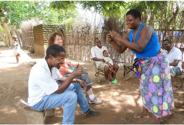 Fig 3. Camera Training 2. The older female participant capturing a test shot of the CAPS Senior Fieldworker.