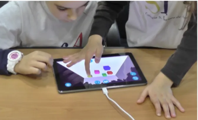 Fig. 4. Children interacting with Cubus system.