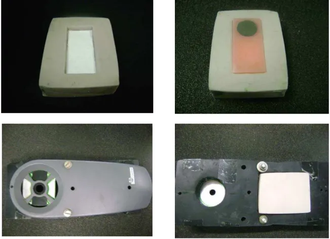 Fig. 22 – Dispositivos de silicona com corpo-de-prova posicionado e borracha preta para  padronização da leitura de cor