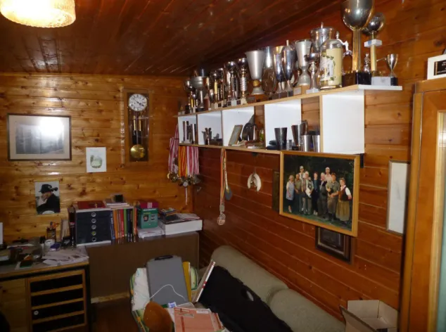 Fig. 9 - The interior space of the extension used by Joe as an office and display room for  trophies