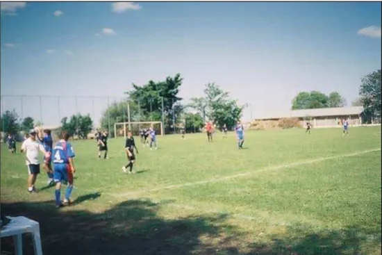 Fig. 7 – Professor passa instruções para jogadores do São Caetano durante a partida. 