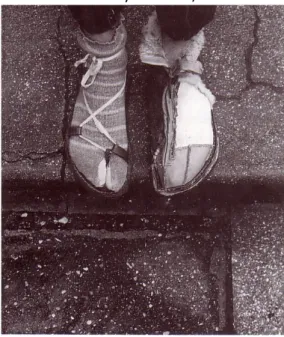 Figure 3. Hundertwasser with winter and summer shoes made by himself, Paris 1950.