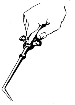 Figura 6-6  Posição  do  maçarico  para  soldar  metais pesados com acetileno. 