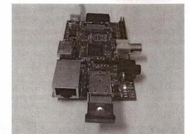 Fig. 3. The multi-robot controller, which consists of a Raspberry Pi mini computer, a Bluetooth dongle, a Wi-Fi dongle and a power supply
