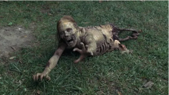 Figura 1. Zumbi rasteja para consumir o protagonista. Fonte: Walking Dead, 2010. Fotograma.