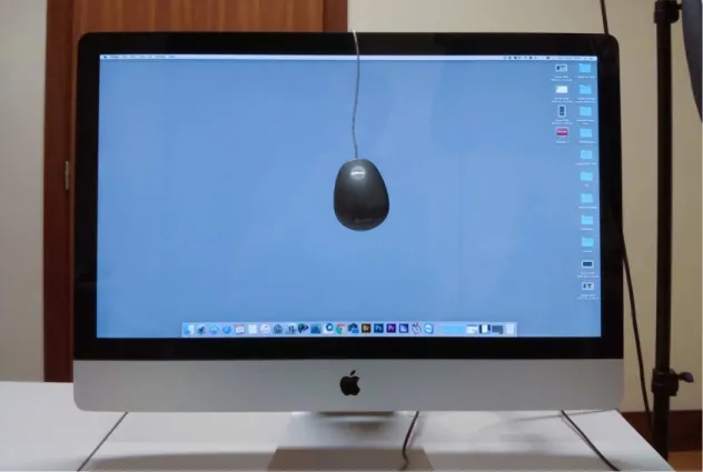 Fig. 19 – colorímetro X-Rite i1Display 2 colocado no centro do monitor do iMac 